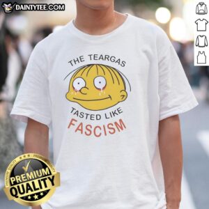Alt Text: Nice The Teargas Tastes Like Fascism T-Shirt featuring bold graphic design and protest-themed message.