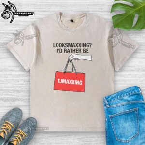 Nice Looksmaxxing ID Rather Be Store Maxxing washed t-shirt displayed on a hanger, showcasing casual style and comfort.
