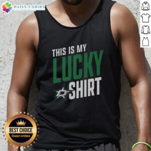 Top Dallas Stars fan wearing a 'This Is My Lucky Tank Top' at a game, showcasing team spirit and excitement.