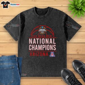 Alt Text: Original Arizona Wildcats 2026 NCAA Men's Basketball National Champions washed t-shirt featuring team logo and colors.