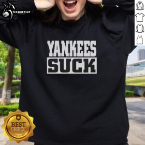 Original Yankees Suck Sweatshirt displayed in a casual setting, featuring bold lettering and a stylish design.