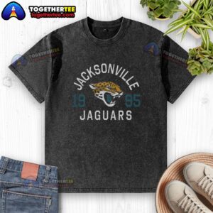 Hot Jacksonville Jaguars Heritage Print Washed T-Shirt featuring team logo and vintage design in bold colors.