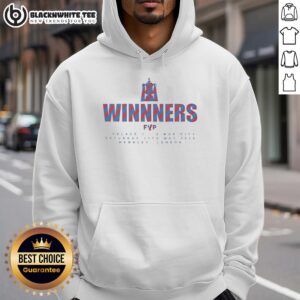 Man wearing a Pretty Winners FVP Palace London hoodie, showcasing street style in a vibrant urban setting.