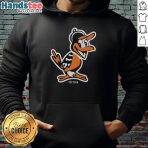 Nice Zay wearing a Baltimore Orioles mascot hoodie, showcasing team spirit and style since 1954.