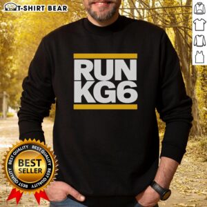 Alt Text: Konnor Griffin of Pittsburgh Pirates wearing a Cool Parody Sweatshirt during a nice run on the field.