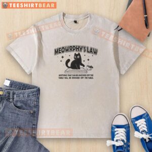 Awesome Meowrphy's Law t-shirt design featuring 'Anything Can & Will Be Knocked Off The Table' graphic.