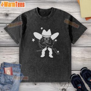 Alt Text: Medium-build guy in a quirky cowboy washed t-shirt, showcasing a unique style and personality.