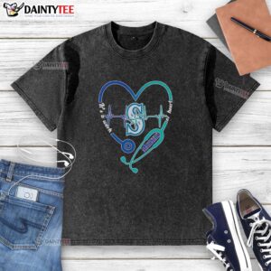 Alt Text: Original Seattle Mariners Heart and Soul washed t-shirt featuring a stethoscope and heartbeat design.