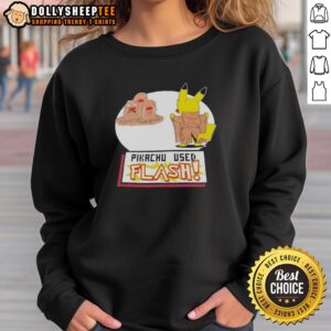 Graphic sweatshirt featuring a vibrant Pikachu using Flash, perfect for Pokmon fans and casual wear enthusiasts.