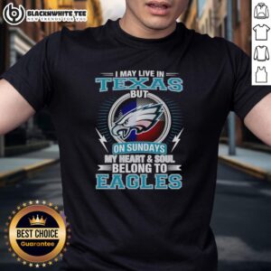 Alt Text: Good Philadelphia Eagles T-shirt - 'I May Live In Texas But My Heart Belongs To Eagles' in vibrant green design.