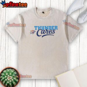 Alt Text: Top Oklahoma City Thunder Cares washed T-shirt featuring team logo and vibrant design, perfect for fans.