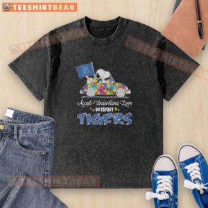 Snoopy and Woodstock driving a car on a Detroit Tigers t-shirt promoting autism acceptance and love.
