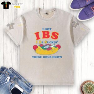 Trendy 'Top I Got Ibs I Be Suckin These Dogs Down' washed t-shirt displayed on a wooden background, perfect for casual wear.