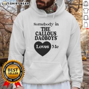 Person wearing a Nice Somebody In The Callous Daoboys Loves Me hoodie, showcasing its unique design and style.
