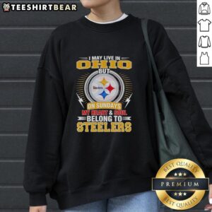 Cozy sweatshirt featuring 'I May Live In Ohio But On Sundays My Heart And Soul Belong To Steelers' design.