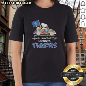 Alt Text: Pretty Snoopy and Woodstock driving a car on a Detroit Tigers ladies tee promoting autism acceptance and love.