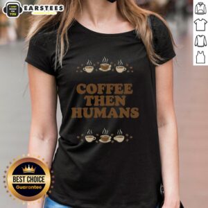 Alt Text: Awesome Coffee First Humans Later Ladies Tee featuring a fun coffee-themed graphic on a stylish women's shirt.