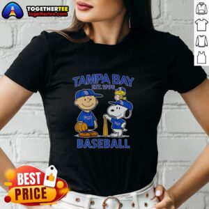 Alt Text: Good Charlie Brown, Snoopy, and Woodstock in Tampa Bay Rays baseball jersey est. 1998 on a ladies tee shirt.