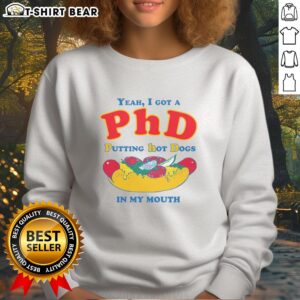 Original 'Yeah I Got A PhD Putting Hot Dogs In My Mouth' sweatshirt with playful design for food lovers and humor enthusiasts.