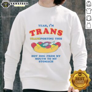 Funny 'Yeah I'm Trans' sweatshirt featuring a humorous graphic of a hot dog being transported to the stomach.