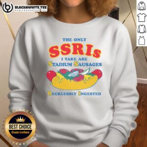 Alt Text: Cozy sweatshirt reading 'The Only SSRIs I Take Are Stadium Sausages' in a casual setting, perfect for food lovers.