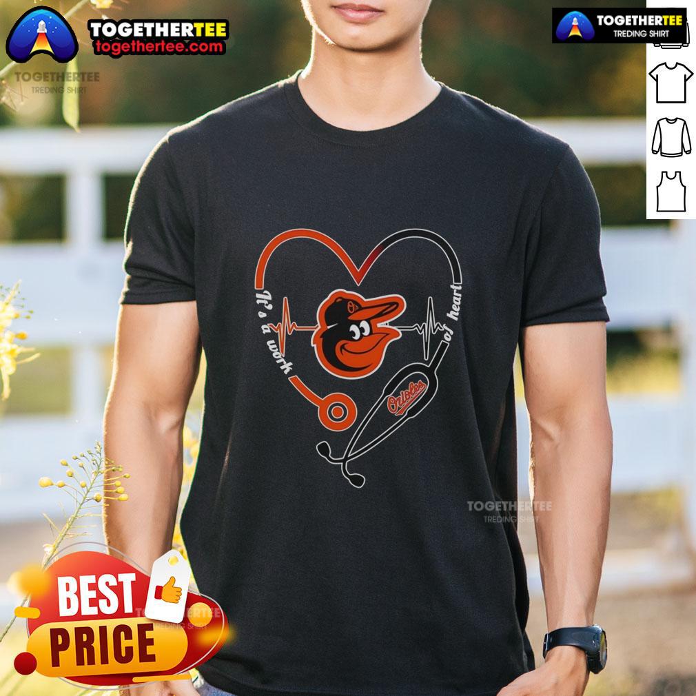 Awesome Baltimore Orioles It's A Work Of Heart Stethoscope And Heartbeat Shape T-Shirt Alt Text: Awesome Baltimore Orioles 'It's A Work Of Heart' T-shirt featuring a stethoscope and heartbeat design.