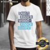 Alt Text: Awesome Don't Knock Wood Knock Doors T-Shirt featuring unique design and bold text, perfect for casual wear.