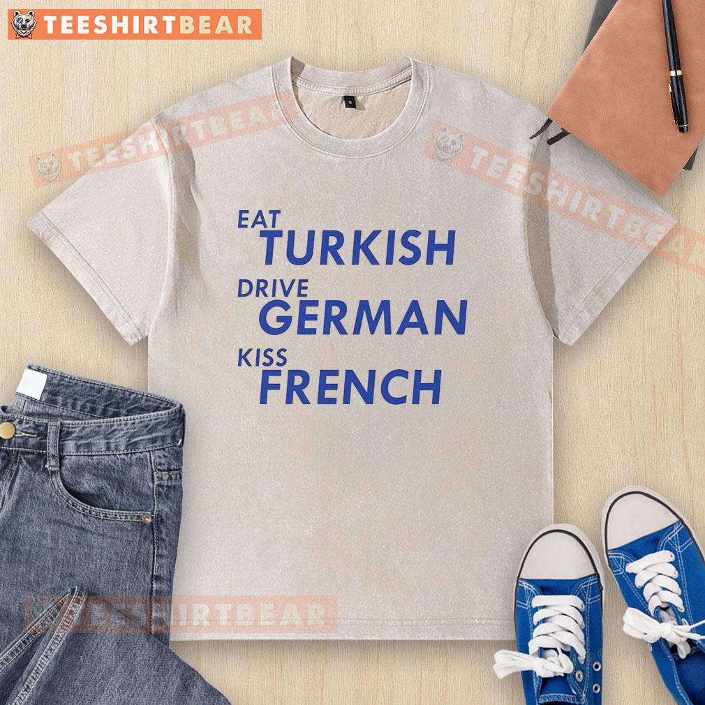awesome-eat-turkish-drive-german-kiss-french-washed-t-shirt Awesome Eat Turkish Drive German Kiss French washed T-shirt displayed on a hanger, featuring vibrant graphic design.