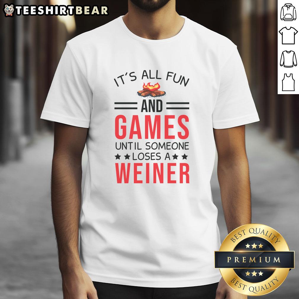 awesome-gamer-camping-its-all-fun-and-games-until-someone-loses-a-weiner-t-shirt-1 Awesome Gamer camping in a humorous 'It's All Fun and Games Until Someone Loses a Wiener' T-shirt.