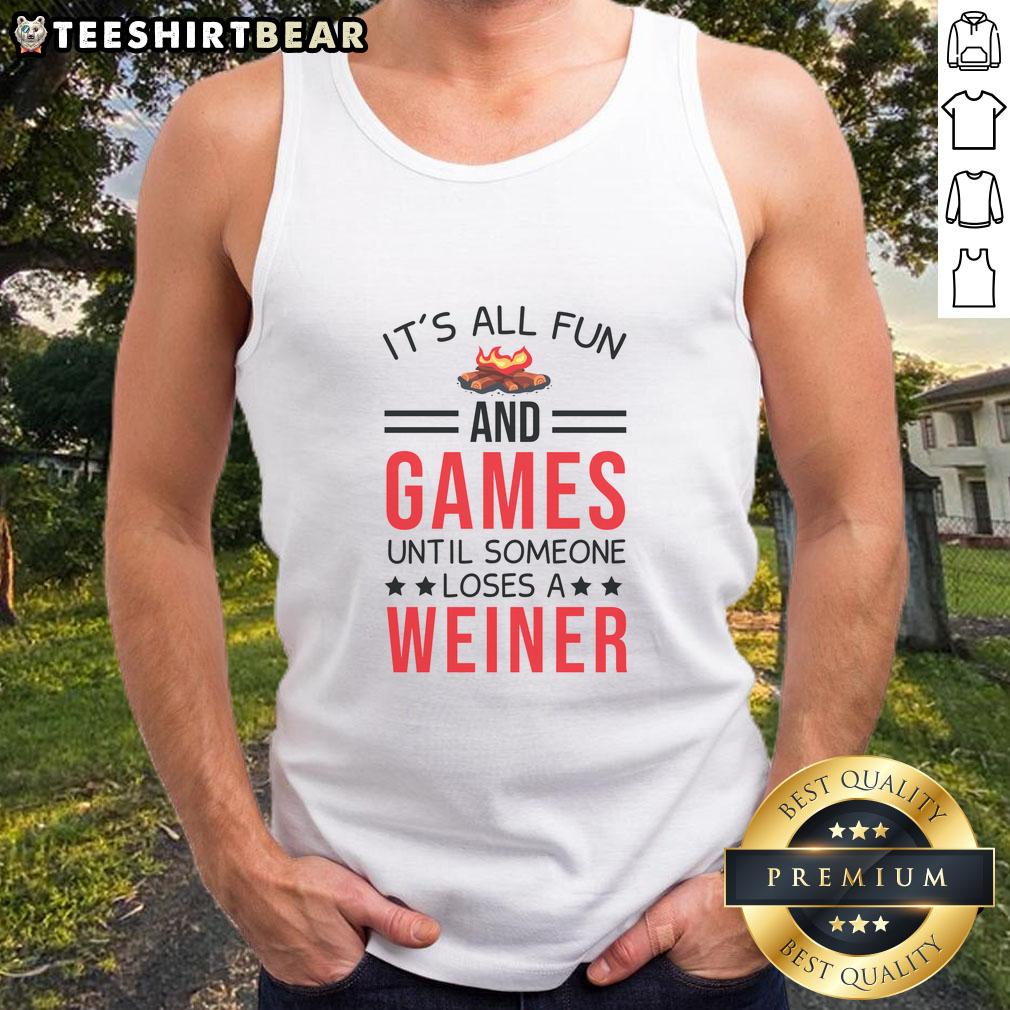 awesome-gamer-camping-its-all-fun-and-games-until-someone-loses-a-weiner-tank-top Awesome gamer camping in a fun setting, wearing 'It's All Fun and Games Until Someone Loses a Wiener' tank top.