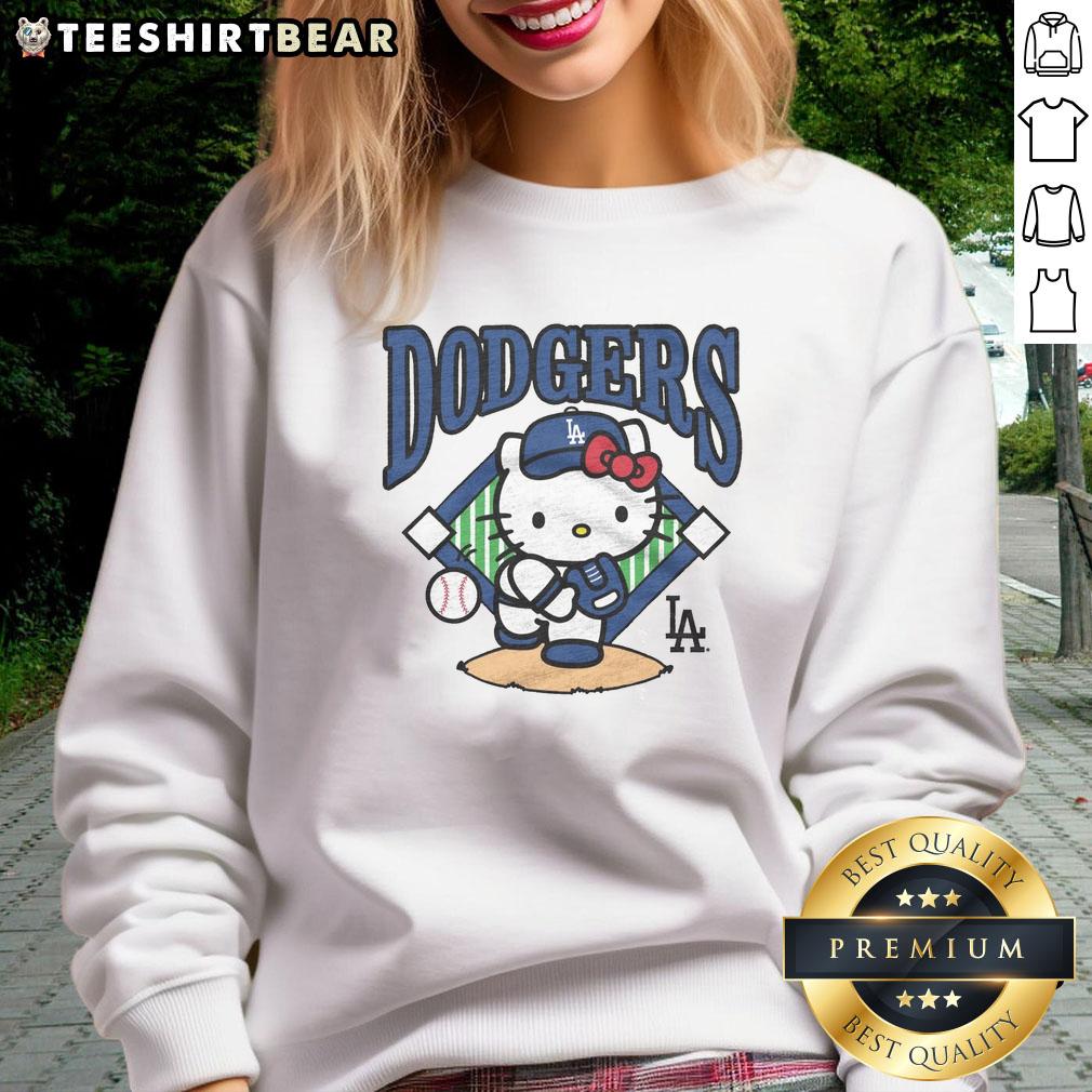 awesome-hello-kitty-x-los-angeles-dodgers-first-pitch-sweatshirt Awesome Hello Kitty x Los Angeles Dodgers first pitch sweatshirt featuring playful design and vibrant team colors.