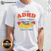 Awesome I Got ADHD Always Downin' Hot Dogs T-Shirt featuring fun graphics and vibrant colors for ADHD awareness.