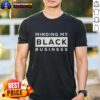 Awesome Minding My Black Business T-Shirt featuring bold text design, perfect for expressing pride and empowerment.