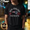 Alt Text: Awesome New England Patriots Heritage Print T-Shirt featuring the team's logo and vintage design in team colors.