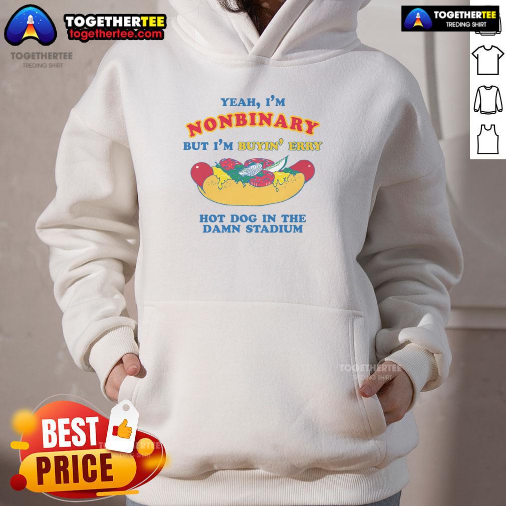 Awesome Yeah I'M Nonbinary But I'M Buyin' Erry Hot Dog In The Stadium Hoodie Nonbinary person wearing 'Awesome Yeah I'm Nonbinary But I'm Buyin Erry Hot Dog In The Stadium' hoodie at a stadium.