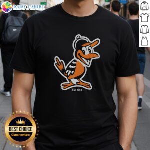 Hot Zay Flowers wearing a Baltimore Orioles mascot T-shirt, established 1954, showcasing team spirit and style.