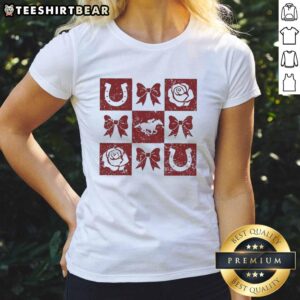 Top greatest race horse design featuring horseshoe and bow rose icons on a ladies tee shirt.
