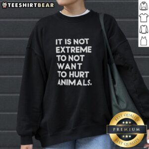 Cozy sweatshirt with 'It's Not Extreme To Not Want To Hurt Animals' slogan, promoting animal welfare and compassion.