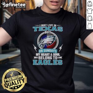 Alt Text: Pretty Philadelphia Eagles t-shirt with 'I May Live In Texas But My Heart Belongs To Eagles' design.