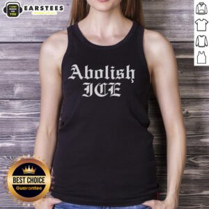 Alt Text: Awesome Brody King wearing an Abolish ICE tank top, showcasing a bold statement and unique style.