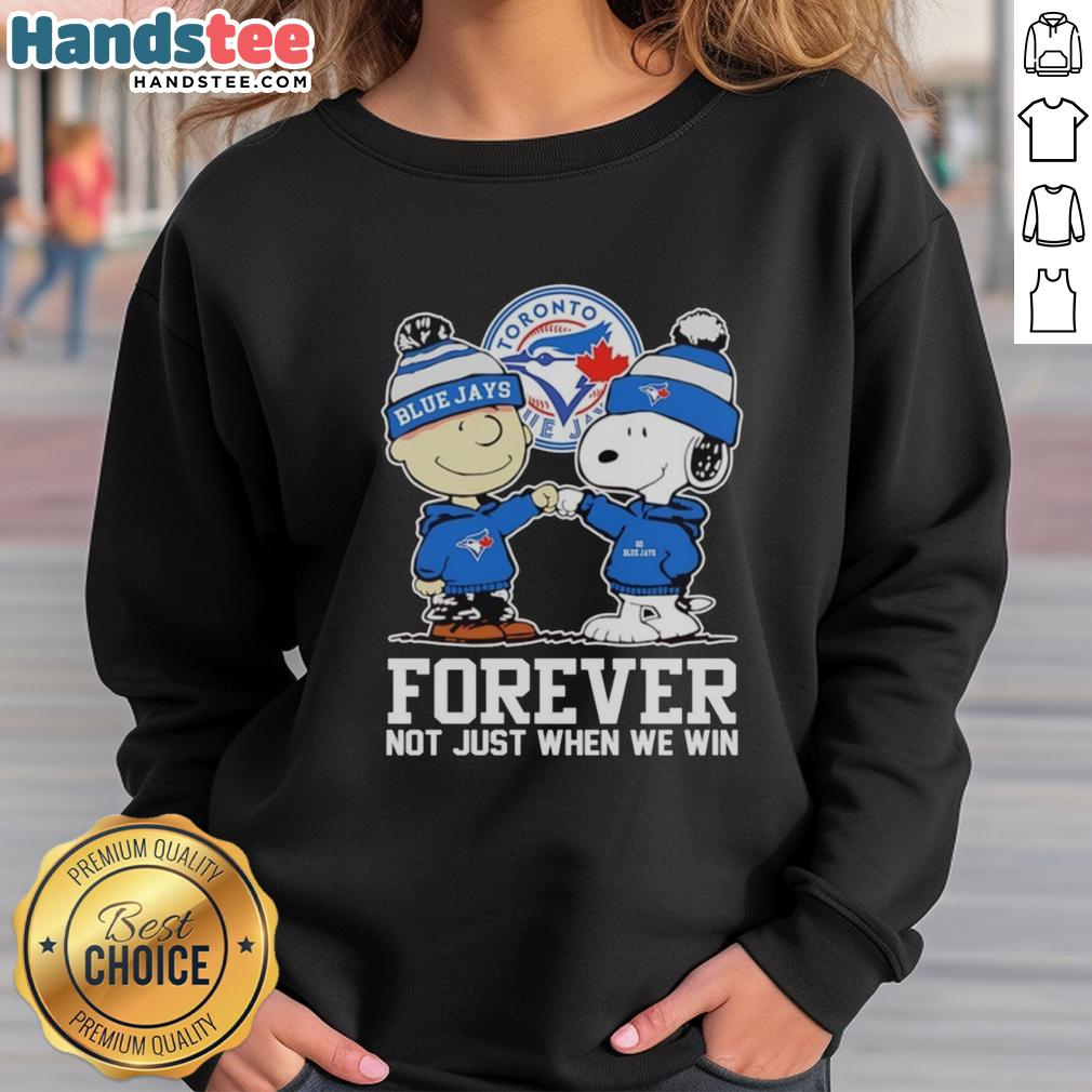 cute-charlie-brown-fist-pump-snoopy-with-outfit-of-toronto-blue-jays-forever-not-just-when-we-win-sweatshirt Charlie Brown fist pump in Toronto Blue Jays sweatshirt, celebrating fandom with Snoopy. Cute sports apparel for fans.