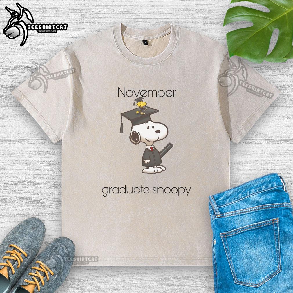 cute-november-graduate-snoopy-woodstock-washed-t-shirt Alt Text: Cute November graduate Snoopy and Woodstock on a washed t-shirt, perfect for celebrating graduation in style.