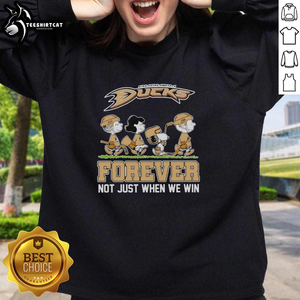 cute-peanuts-characters-x-anaheim-ducks-nhl-forever-not-just-when-we-win-sweatshirt Alt Text: Cute Peanuts characters with Anaheim Ducks logo on sweatshirt, celebrating NHL fans' passion, Forever Not Just When We Win.