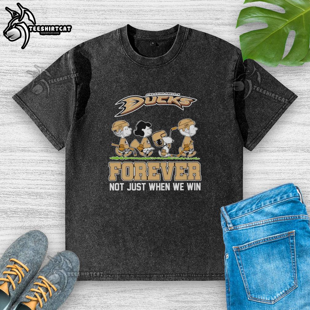 cute-peanuts-characters-x-anaheim-ducks-nhl-forever-not-just-when-we-win-washed-t-shirt Alt Text: Cute Peanuts characters on Anaheim Ducks NHL Forever t-shirt, showcasing team spirit beyond just winning.