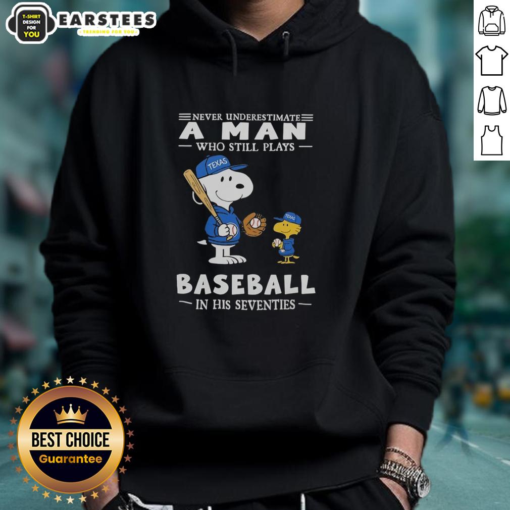 cute-the-peanuts-x-texas-rangers-never-underestimate-a-man-who-still-plays-baseball-in-his-seventies-hoodie Alt Text: Cute Peanuts X Texas Rangers hoodie featuring 'Never Underestimate A Man Who Still Plays Baseball In His Seventies' design.