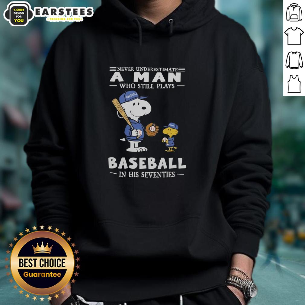 cute-the-peanuts-x-toronto-blue-jays-never-underestimate-a-man-who-still-plays-baseball-in-his-seventies-hoodie Alt Text: Cute Peanuts x Toronto Blue Jays hoodie featuring Never Underestimate A Man Who Still Plays Baseball In His Seventies.