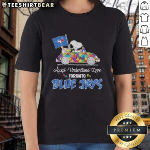 Alt Text: Cute Snoopy and Woodstock driving a car, promoting autism acceptance on a Toronto Blue Jays ladies tee.