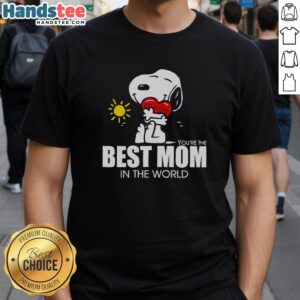 Alt Text: Premium Snoopy hugging a heart on a Best Mom In The World T-shirt, perfect gift for loving mothers.