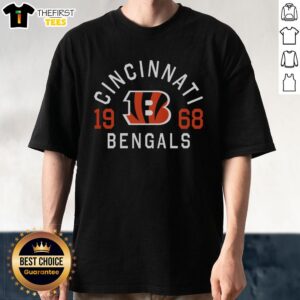 Alt Text: Official Cincinnati Bengals Heritage Print T-Shirt featuring vintage design and team logo for fans and collectors.