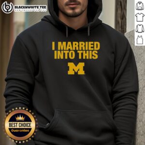 Woman proudly wearing a Michigan Wolverines hoodie, celebrating her marriage into the Wolverines family.